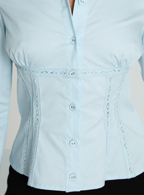 back view of model wearing Princess Polly Merritt Top Blue Full Sleeves V-Neck 