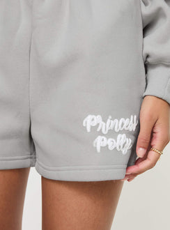 back view of model wearing Princess Polly Princess Polly Track Shorts Puff Text Grey 