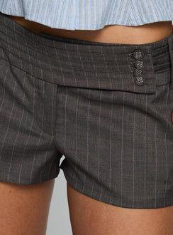 back view of model wearing Princess Polly Body Electric Low Rise Shorts Brown Pinstripe Low Rise Shorts 