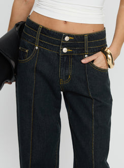 side view of model wearing Princess Polly Hannalee Low Rise Wide Leg Cargo Jeans Grunge Wash Low Rise Jeans 