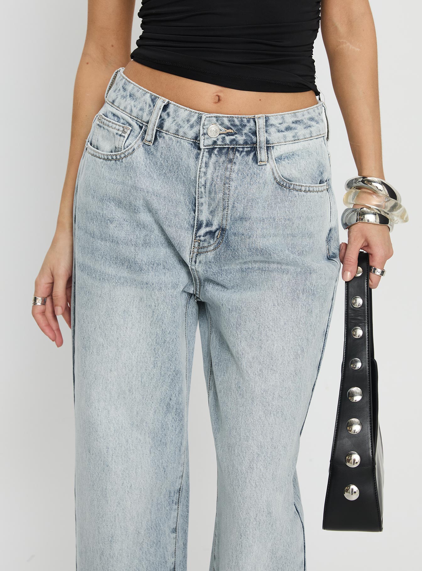 front view of model wearing Princess Polly Henesey High Rise Straight Leg Jeans Light Wash Mid Rise Jeans 