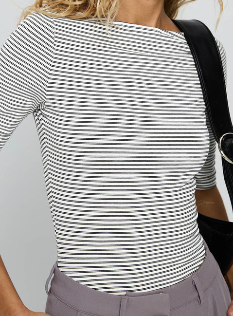 side view of model wearing Princess Polly Here One Moment 3/4 Sleeve Bodysuit Black / White Stripe Half Sleeve 