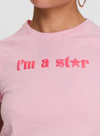 back view of model wearing Princess Polly I'm A Star Graphic Top Pink Short Sleeves Crew Neck 