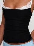 back view of model wearing Princess Polly Renaissance Corset Lace Top Black / White Sleeveless Scoop Neck 