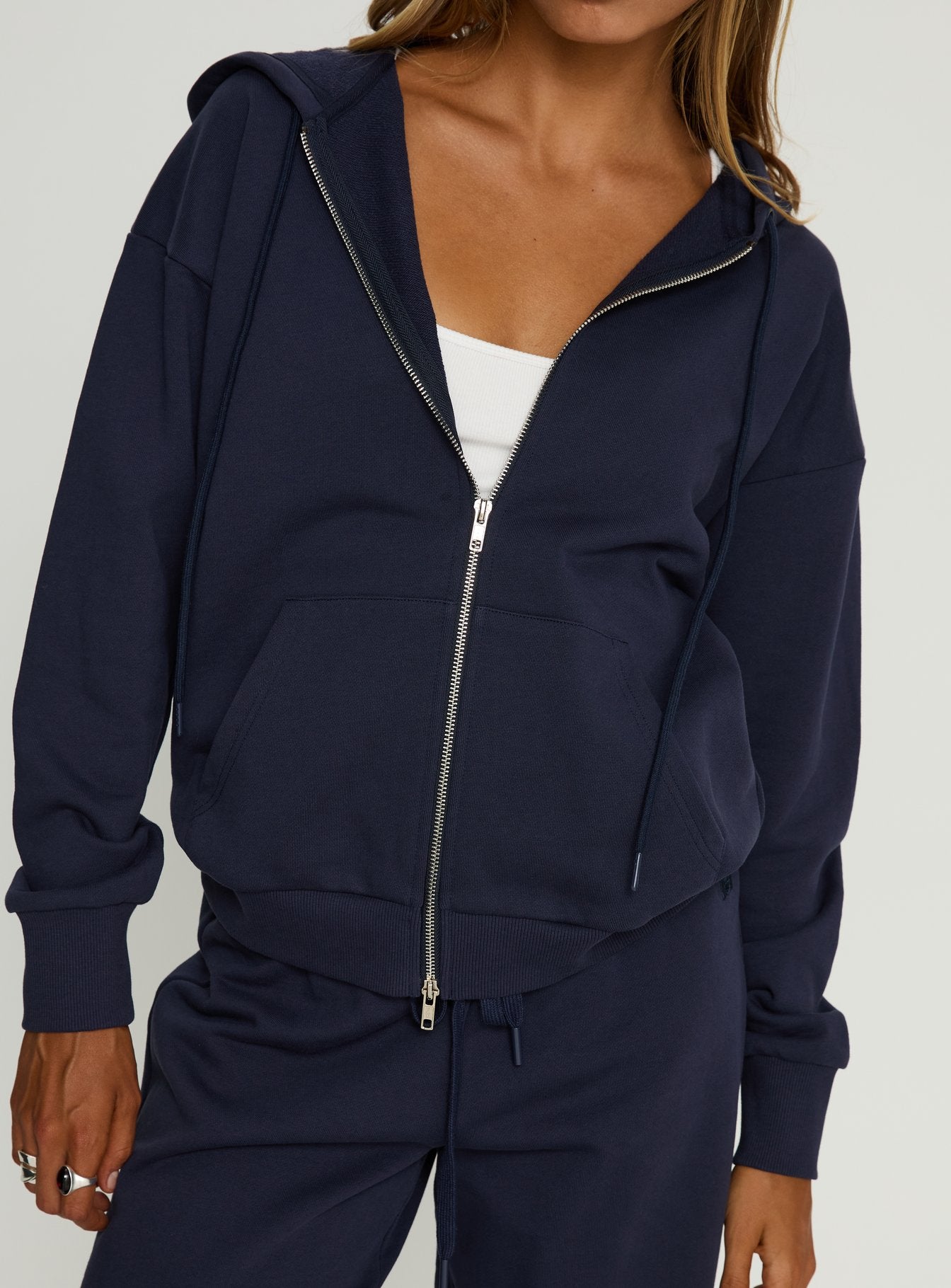 front view of model wearing Princess Polly All Day Oversized Hoodie Navy cropped 