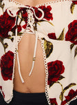 Top Sweetheart neckline, fixed straps, floral print, tie fastening at bust, split hem