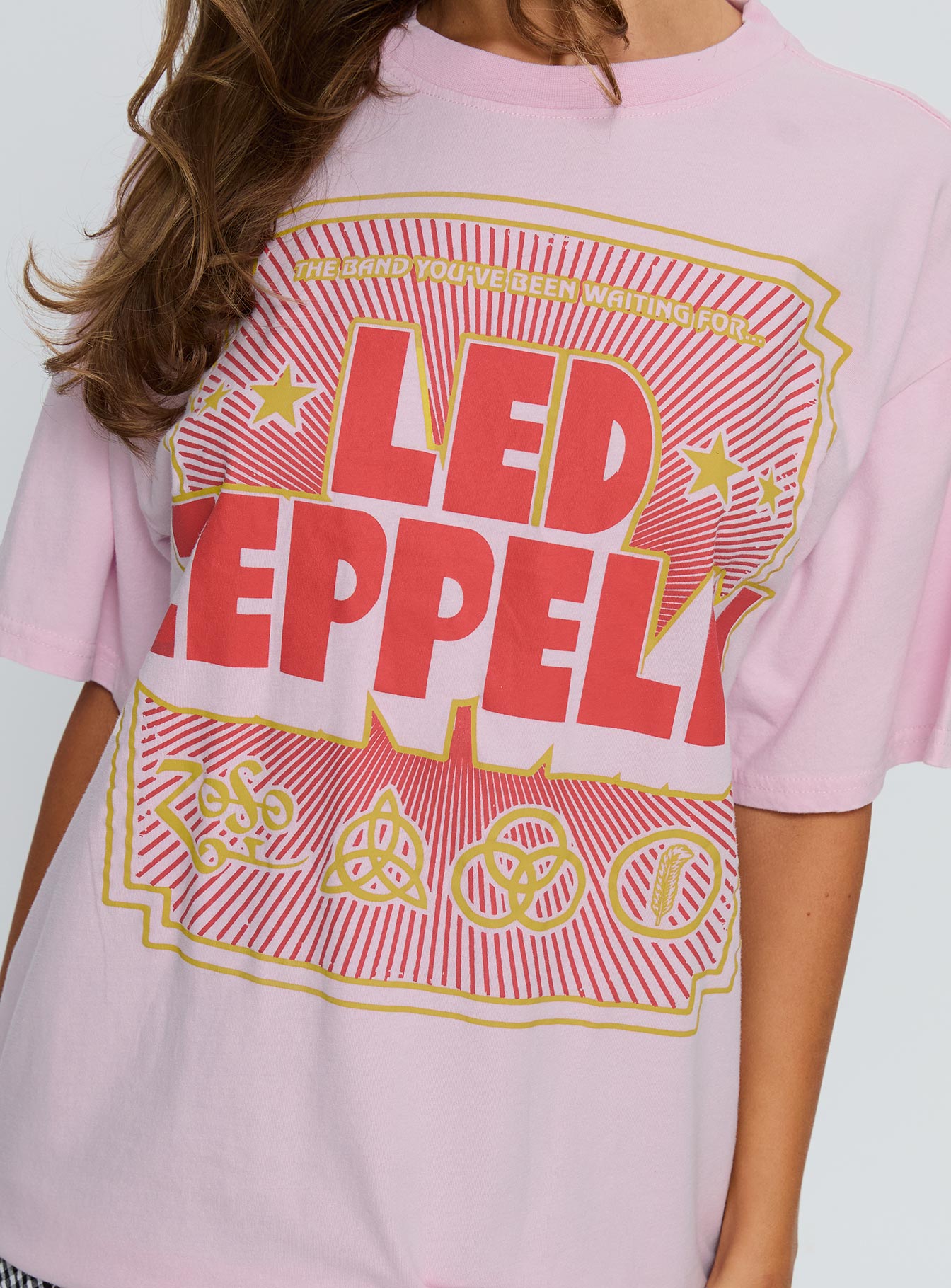 back view of model wearing Princess Polly Led Zeppelin Oversized Vintage Graphic Top Pink Half Sleeves Crew Neck 