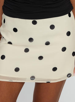   front view of model wearing Princess Polly Adelaida Ruffle Mini Skirt Cream Polka Mini Skirts 