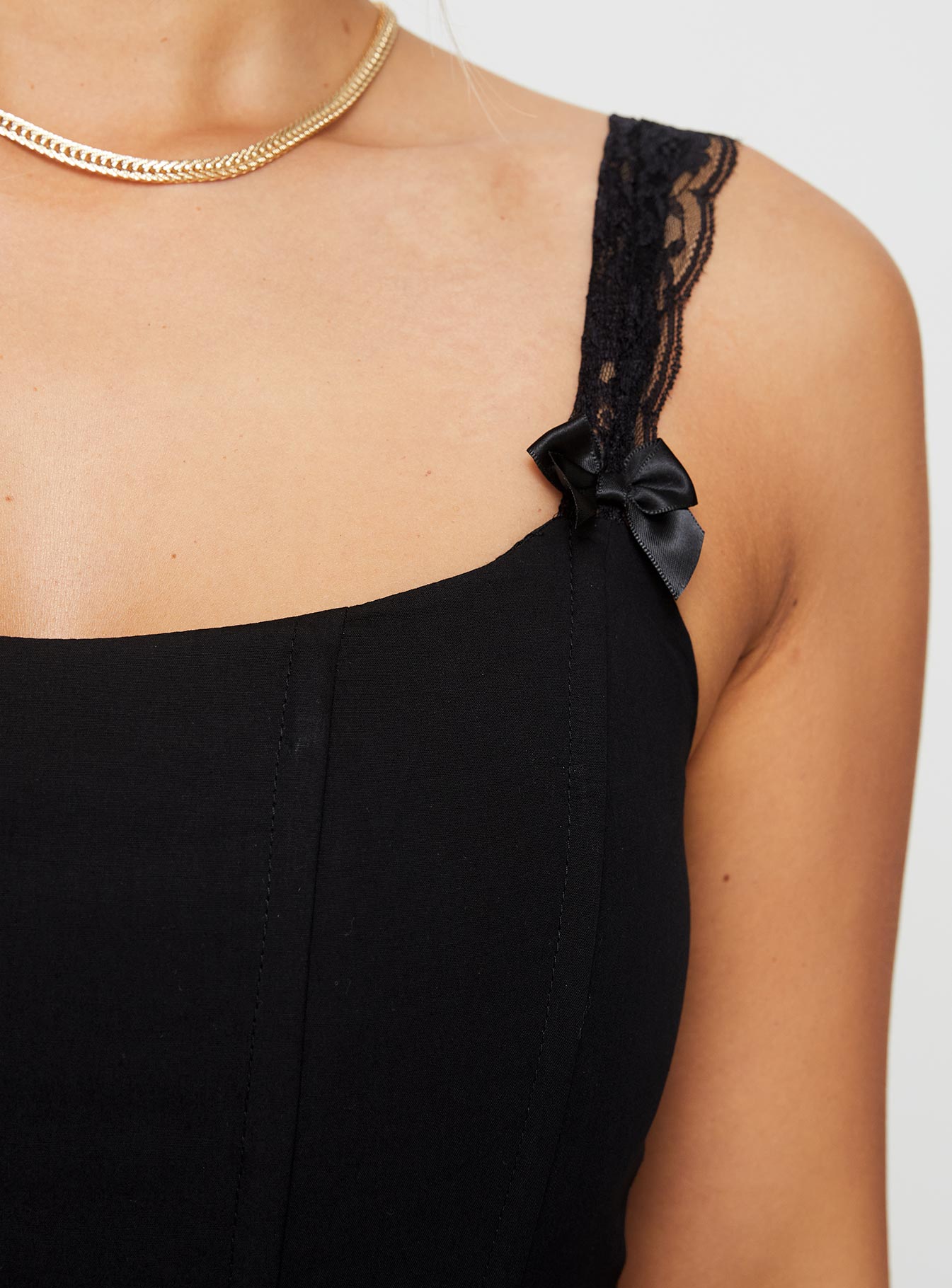 back view of model wearing Princess Polly Thaxten Top Black Sleeveless Square Neck 