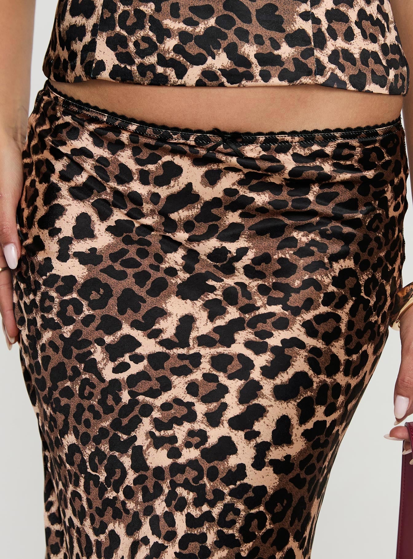 back view of model wearing Princess Polly Enigmatic Maxi Skirt Leopard Maxi 