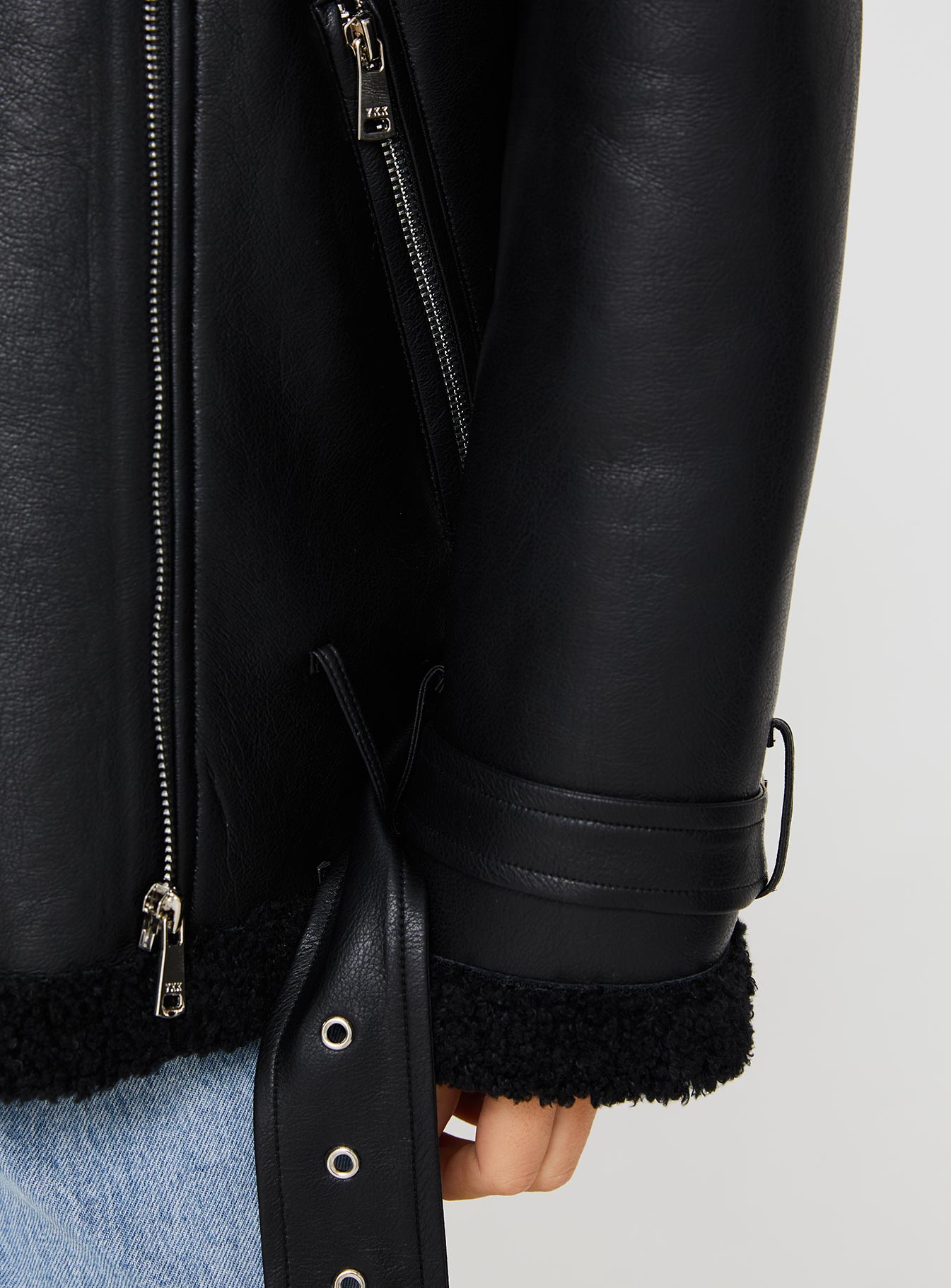 Faux leather jacket Silver-toned hardware, zip fastening down front, twin hip pockets, adjustable & removable belt Non-stretch material, shearling lined