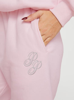 back view of model wearing Princess Polly Princess Polly Track Pants Script Baby Pink / Grey Mid Rise 