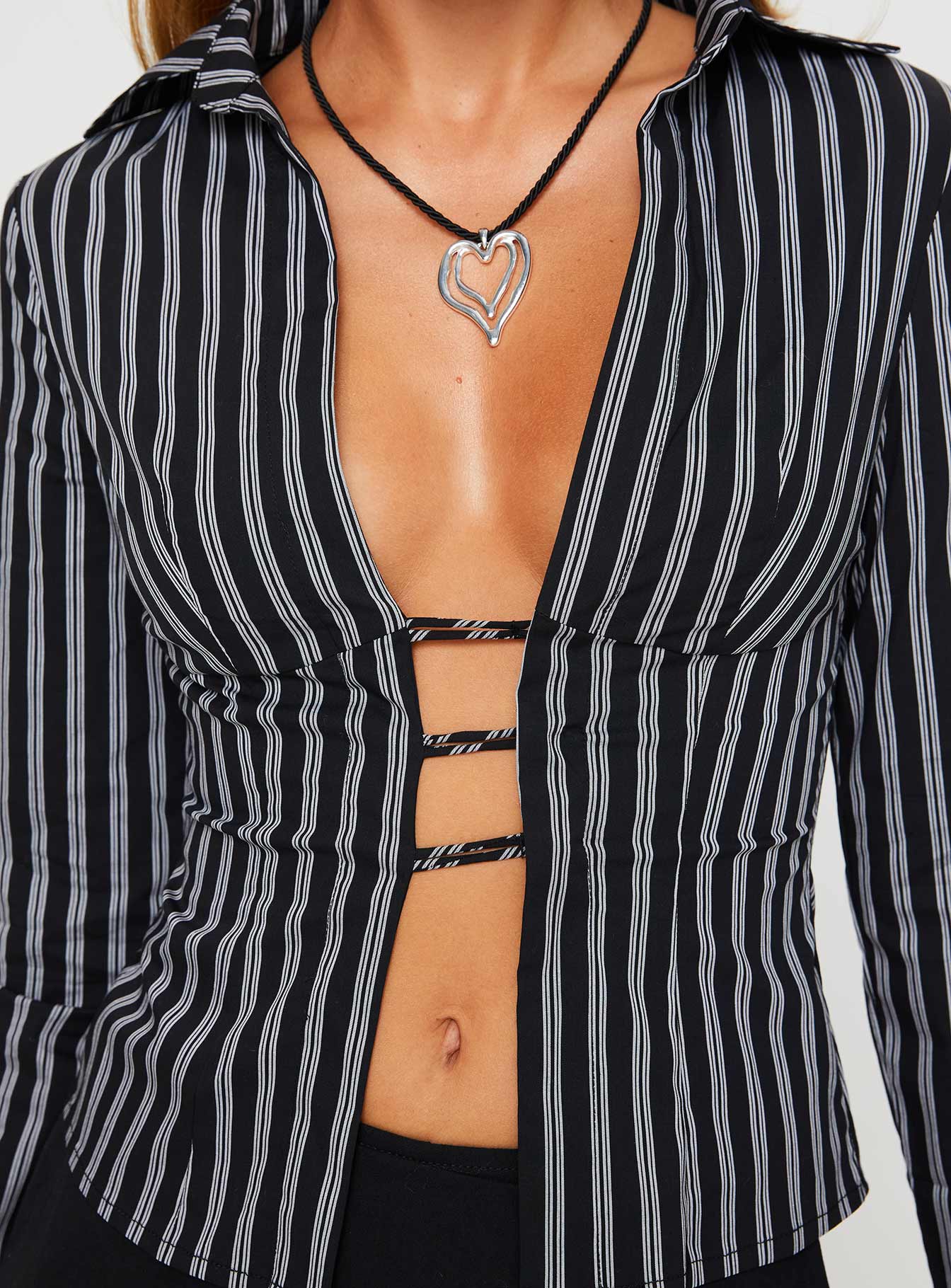 Front view of model wearing  front Princess Polly Full Sleeves Plunger  Nial Long Sleeve Top Black Stripe