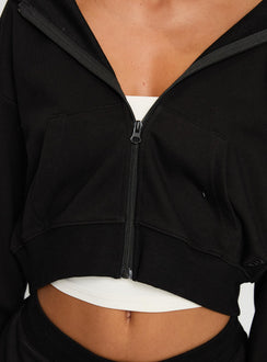 back view of model wearing Princess Polly Revive Zip Through Hoodie Black cropped 