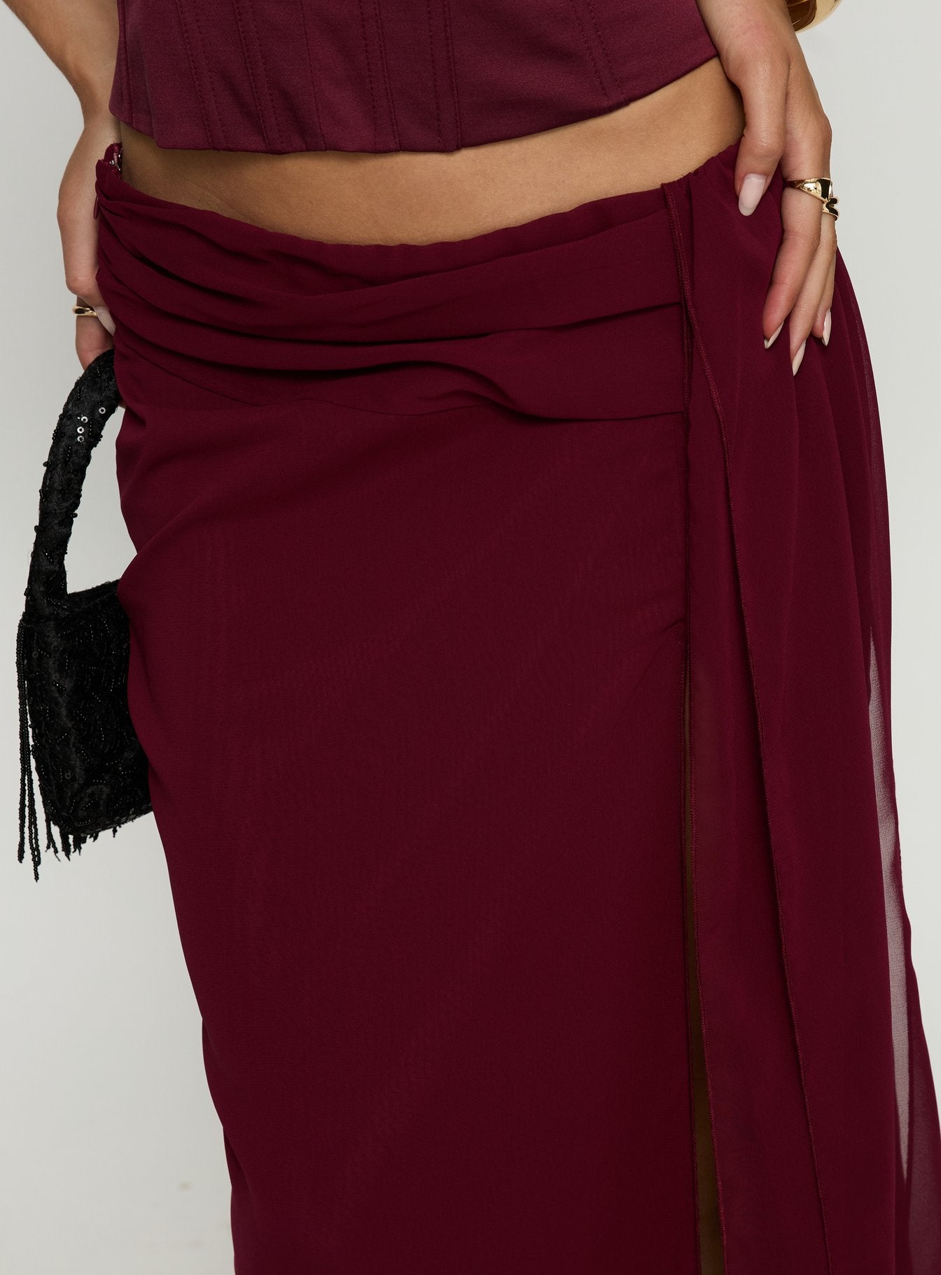 back view of model wearing Princess Polly Hollian Draped Maxi Skirt Wine Maxi Skirts 