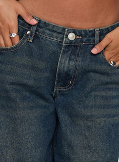 back view of model wearing Princess Polly Low Rise Wide Leg Jean Hocus Pocus Wash Low Rise Jeans 