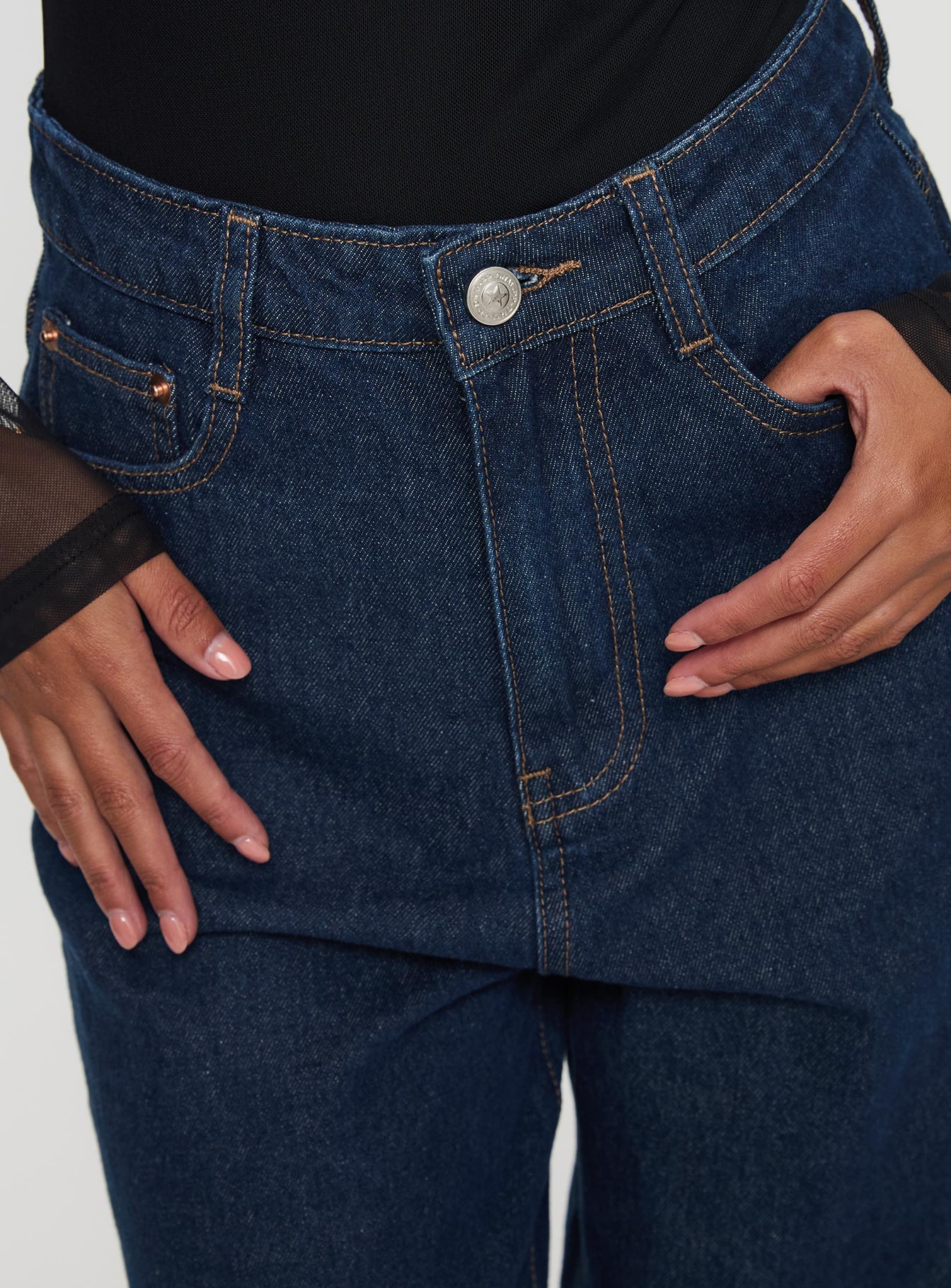 front view of model wearing Princess Polly Nicolo Jeans Mid Raw Denim High Waisted 