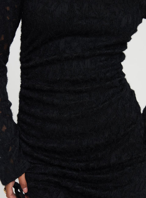 back view of model wearing Princess Polly Que Sera Long Sleeve Mini Dress Black Boat Neck 