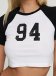 back view of model wearing Princess Polly Lucky Number Top White Short Sleeves Crew Neck 