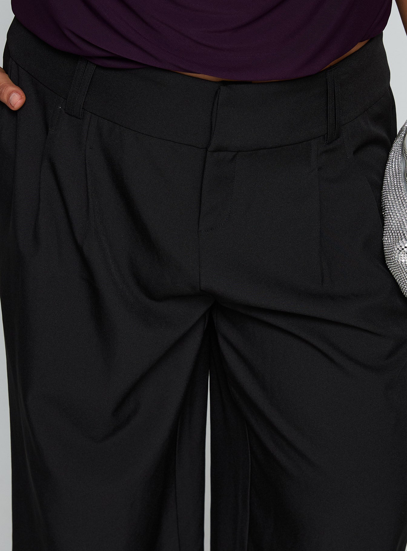 side view of model wearing Princess Polly Two Lovers Low Rise Pants Black Curve Low Rise Pants 