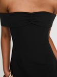 back view of model wearing Princess Polly Lanes Off The Shoulder Mini Dress Black Straight Neck 