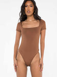 front view of model wearing Princess Polly Byer Bodysuit Brown Short Sleeves Square Neck 