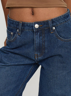 back view of model wearing Princess Polly Everlong Jean Dark Blue Wash Mid Rise 