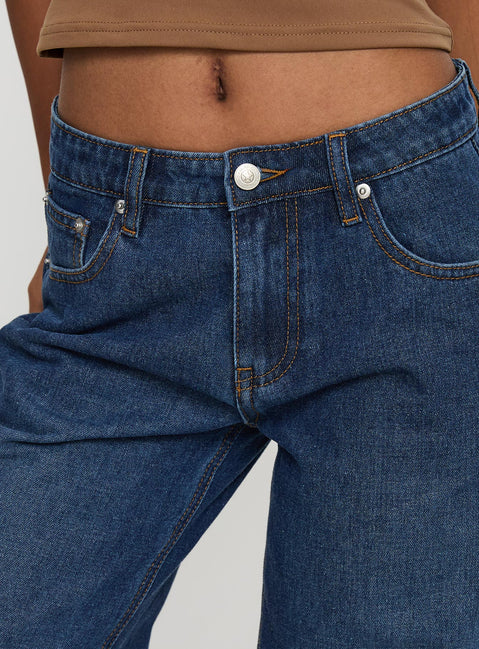 back view of model wearing Princess Polly Everlong Jean Dark Blue Wash Mid Rise 