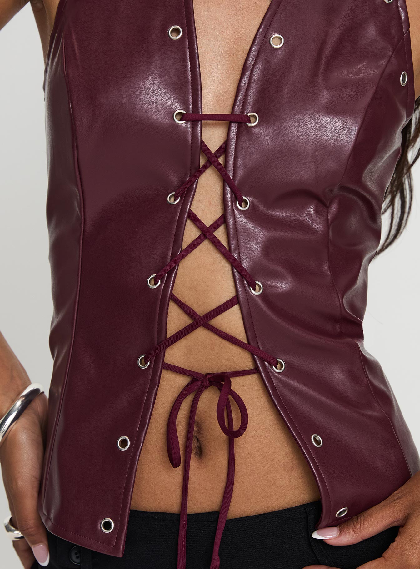 back view of model wearing Princess Polly I've Been There Faux Leather Halter Top Red Sleeveless V-Neck 