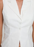 front view of model wearing Princess Polly Campus Long Line Vest White Sleeveless V-Neck 