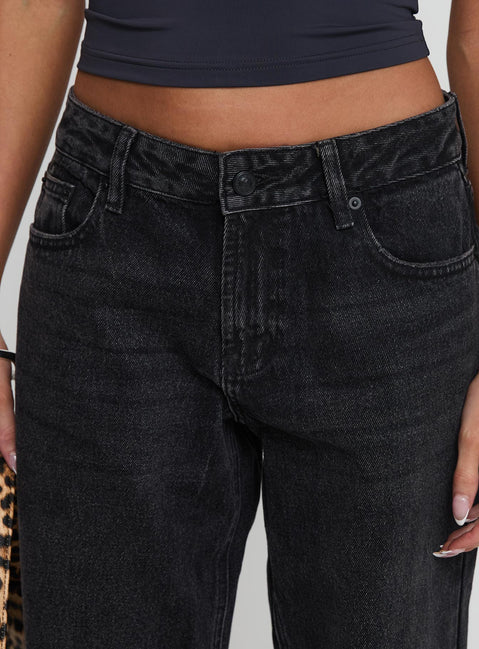 back view of model wearing Princess Polly Serenitia Mid Rise Relaxed Jeans Washed Black Tall Mid Rise 