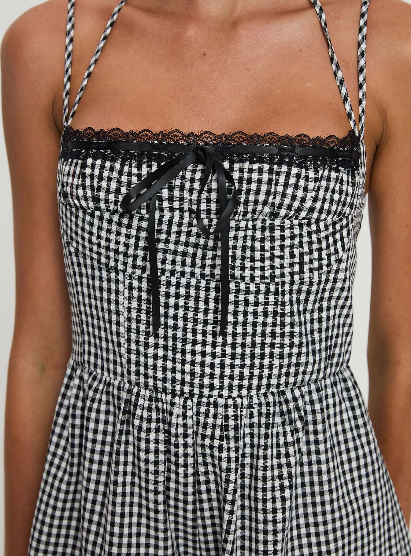 Romper Gingham print, adjustable straps,  lace trim detail, invisible zip fastening Non-stretch material, fully lined 