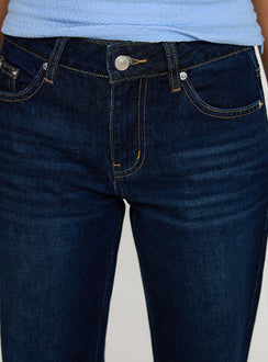 back view of model wearing Princess Polly Rearview Low Rise Jeans Dark Blue Low Rise Jeans 