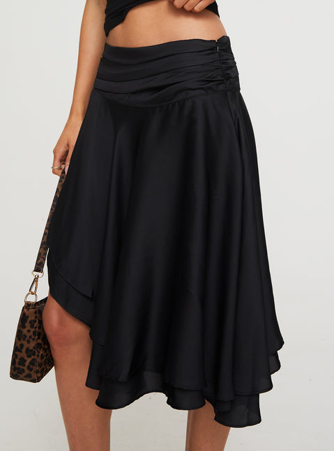   side view of model wearing Princess Polly Legacy Midi Skirt Onyx Midi Skirts 