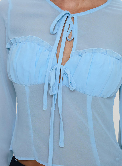 back view of model wearing Princess Polly Coates Long Sleeve Top Blue Full Sleeves Crew Neck 