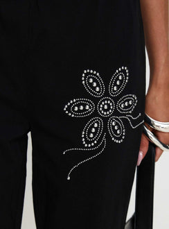back view of model wearing Princess Polly Quotation Diamante Flare Pants Black Low Rise Pants 