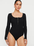 front view of model wearing Princess Polly Zuma Long Sleeve Bodysuit Black Full Sleeves 