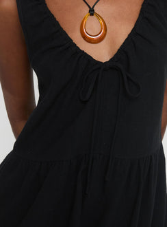 Romper Fixed shoulder straps, v-neckline, tie fastening at bust, invisible zip fastening at side, twin hip pockets Non-stretch material, unlined 