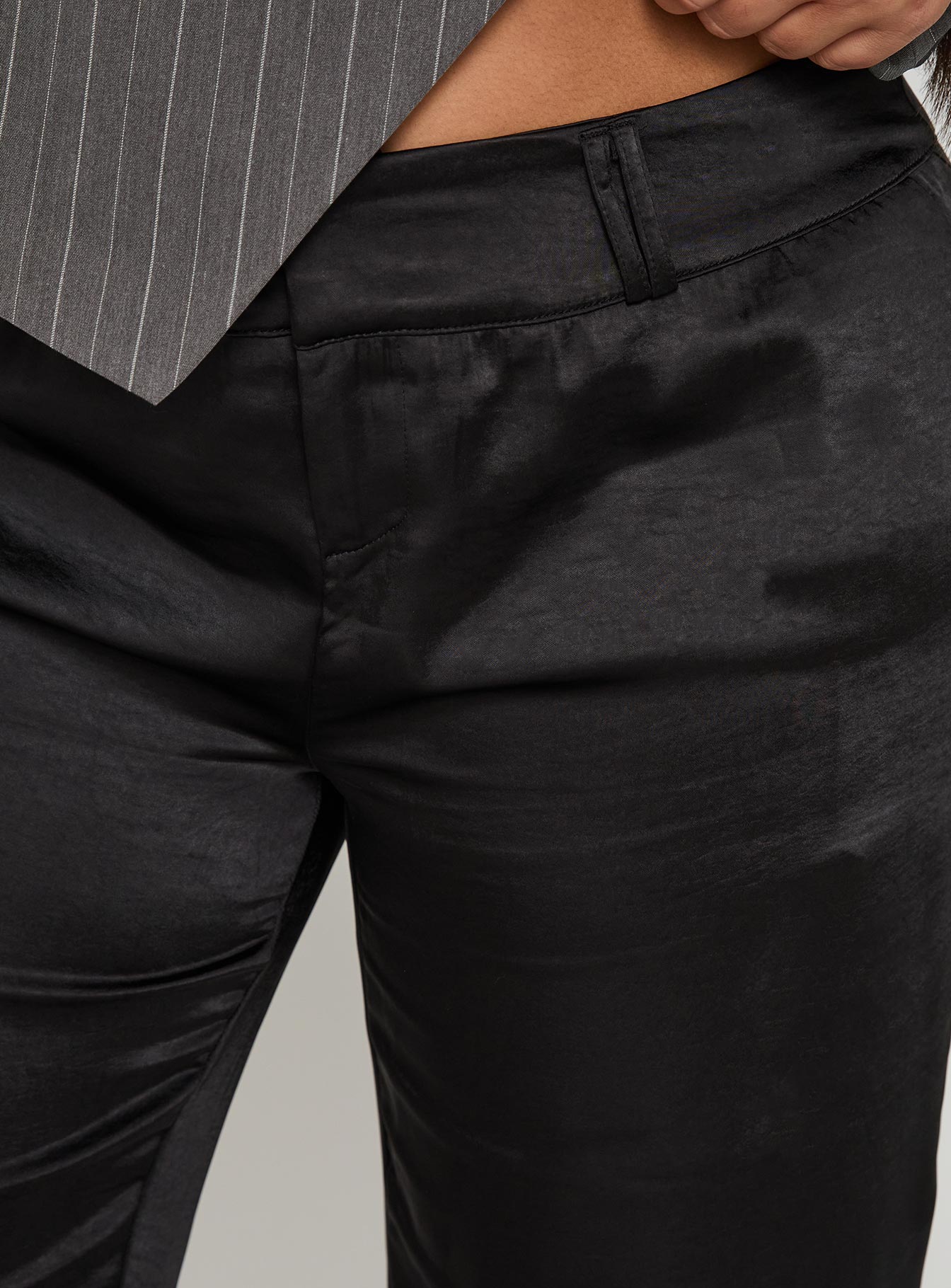 back view of model wearing Princess Polly First Place Low Rise Satin Pant Black Curve Low Rise Pants 