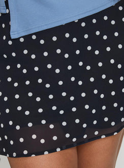 back view of model wearing Princess Polly Dapple Bias Mini Skirt Black Polka Dot Curve Mini Skirts 