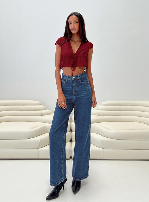 Front view of model wearing  front Princess Polly High Waisted  Nicolo Jeans Mid Blue Denim