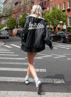 Bomber jacket Faux leather material Fleece detailing Gold toned hardware Classic collar Zip fastening at front Twin hip pockets  Elasticated cuff and waistband