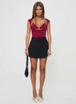 Burgundy top Cut outs at bust, cap sleeves