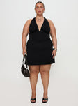 front view of model wearing Princess Polly Tinisie Halter Mini Dress Black Curve Plunger 