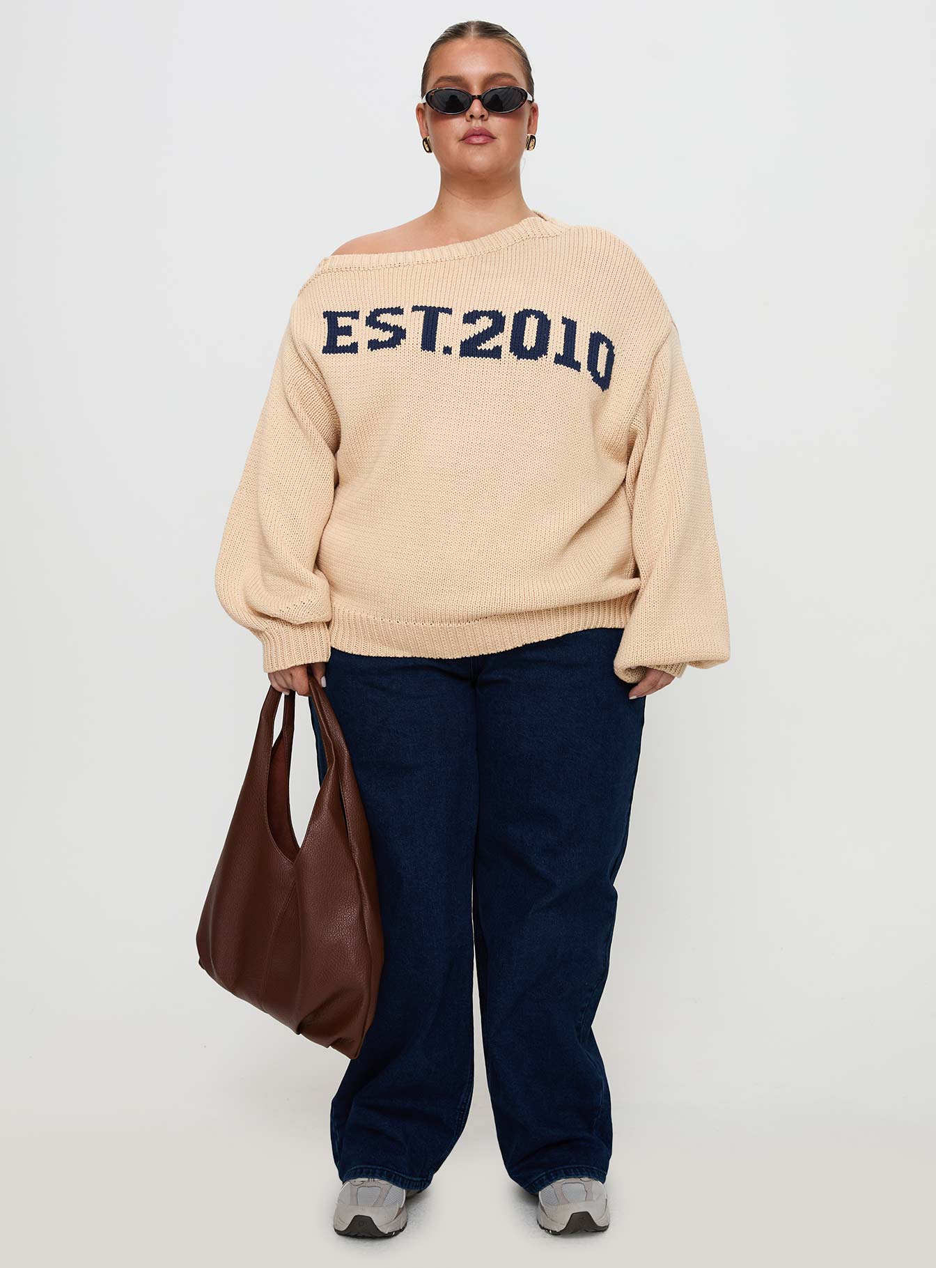 side view of model wearing Princess Polly Jadynn Off Shoulder Knit Sweater Cream Curve 