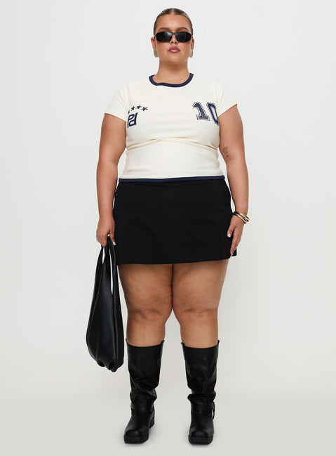 side view of model wearing Princess Polly Track Record Graphic Top Cream Curve Short Sleeves Crew Neck 