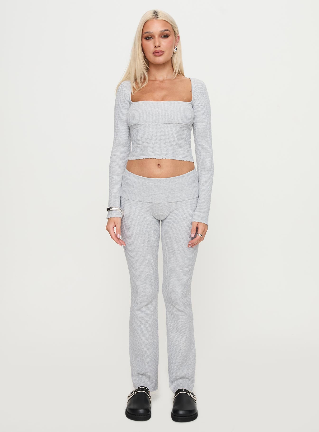 front view of model wearing Princess Polly Closed Eyes Flared Pant Grey Low Rise Pants 