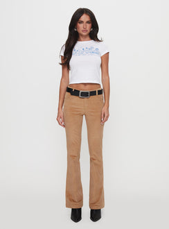front view of model wearing Princess Polly Troubadour Low Waist Jeans Tan 
