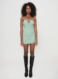 side view of model wearing Princess Polly Alari Mini Dress Sage Sweetheart Neckline 