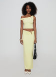   side view of model wearing Princess Polly Whiley Maxi Skirt Cream Maxi 